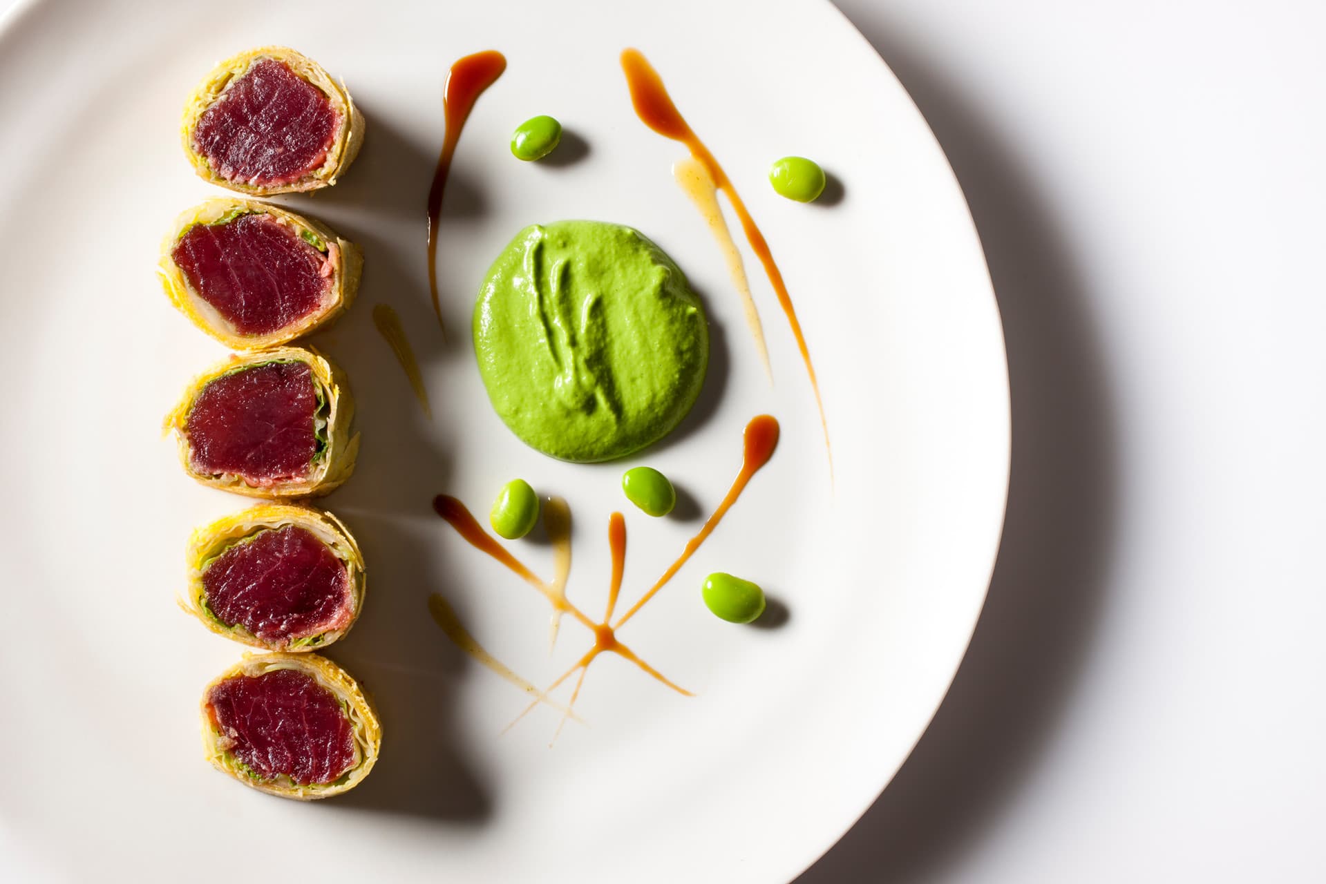 Plate of tuna rolls.