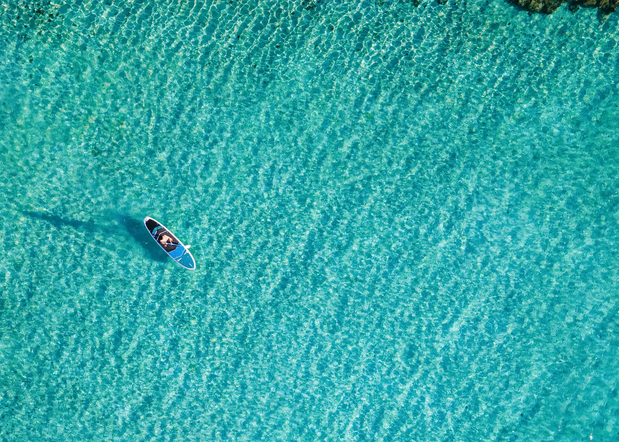 Image of paddle board in ocean